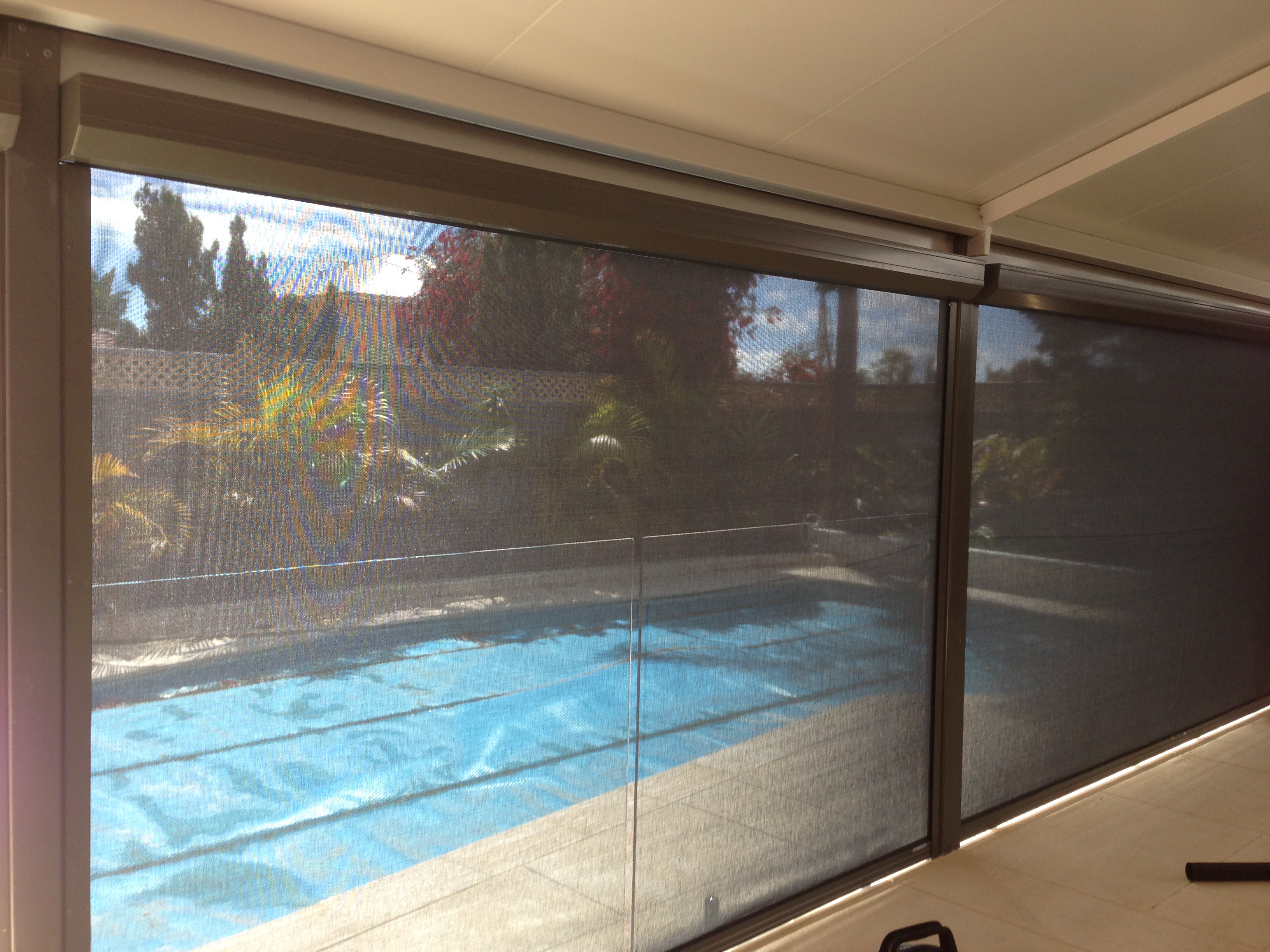Clear PVC cafe blinds on a Sydney balcony