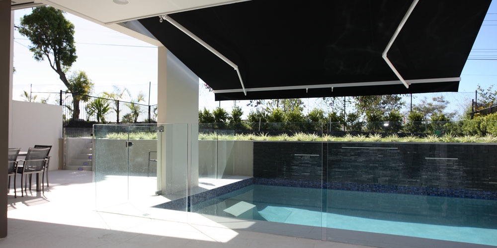 Folding arm awning shading a Sydney deck