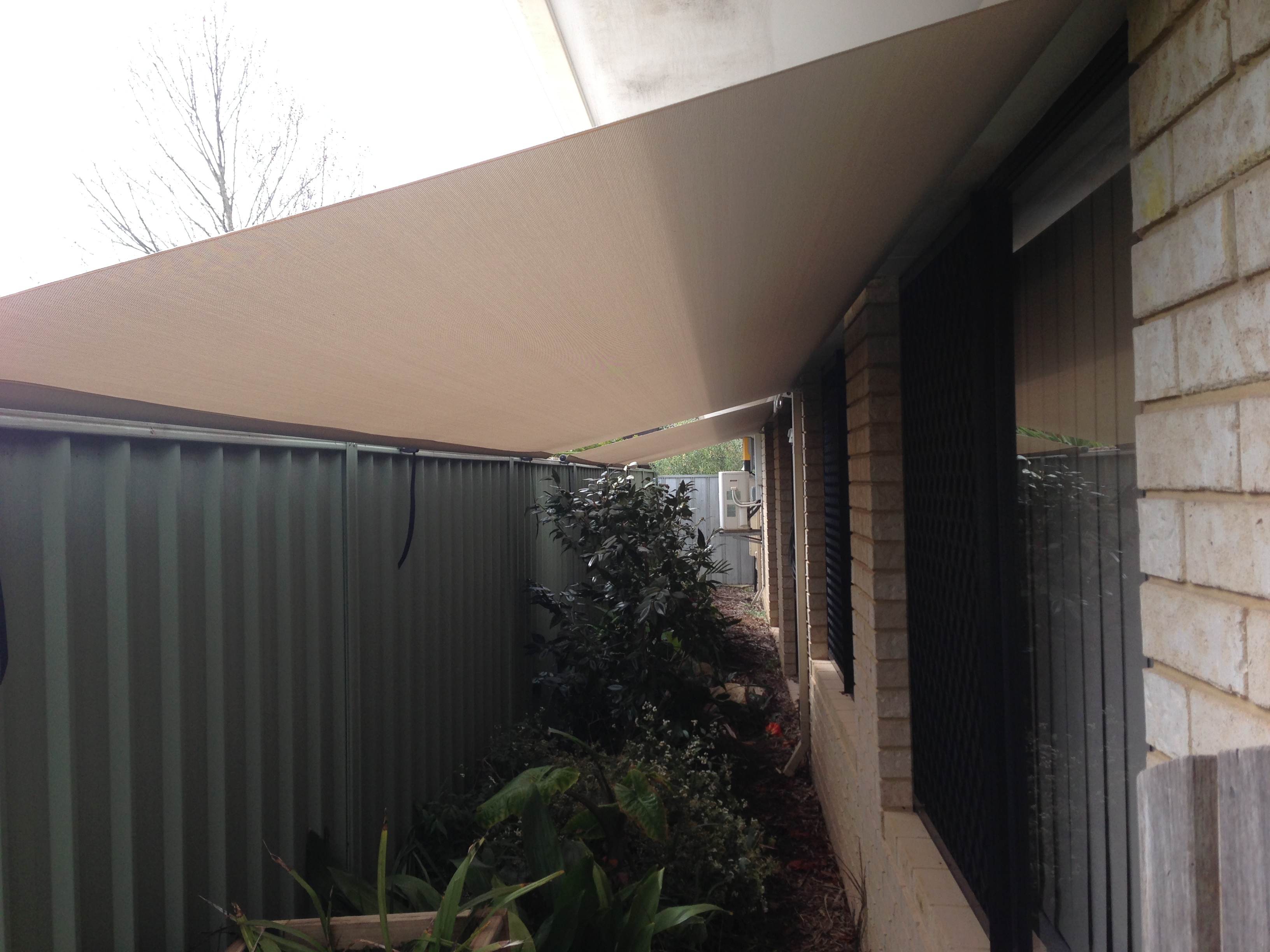 Full-height roof to fence blinds in Sydney
