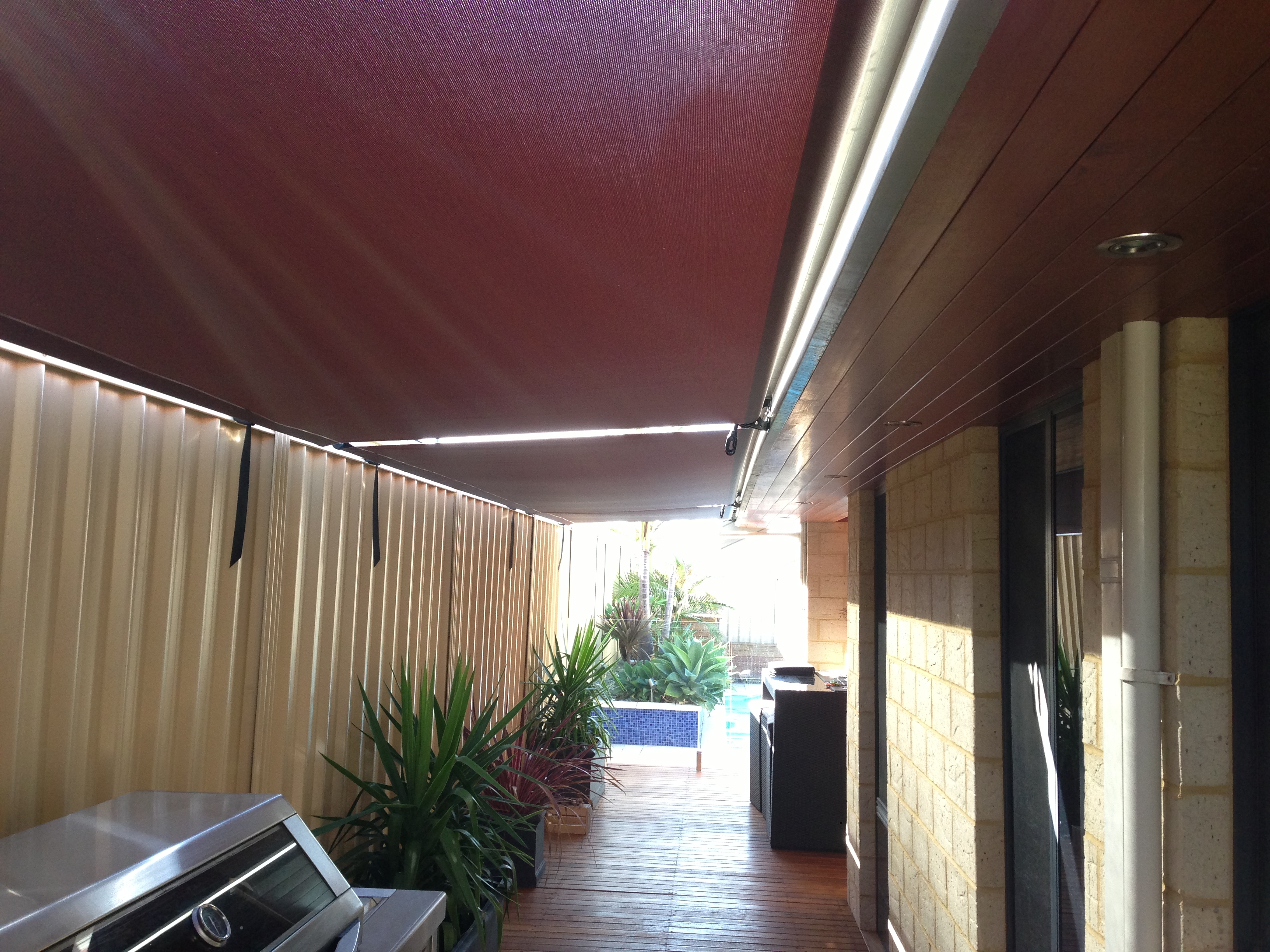 Roof to fence outdoor blinds installed in Sydney