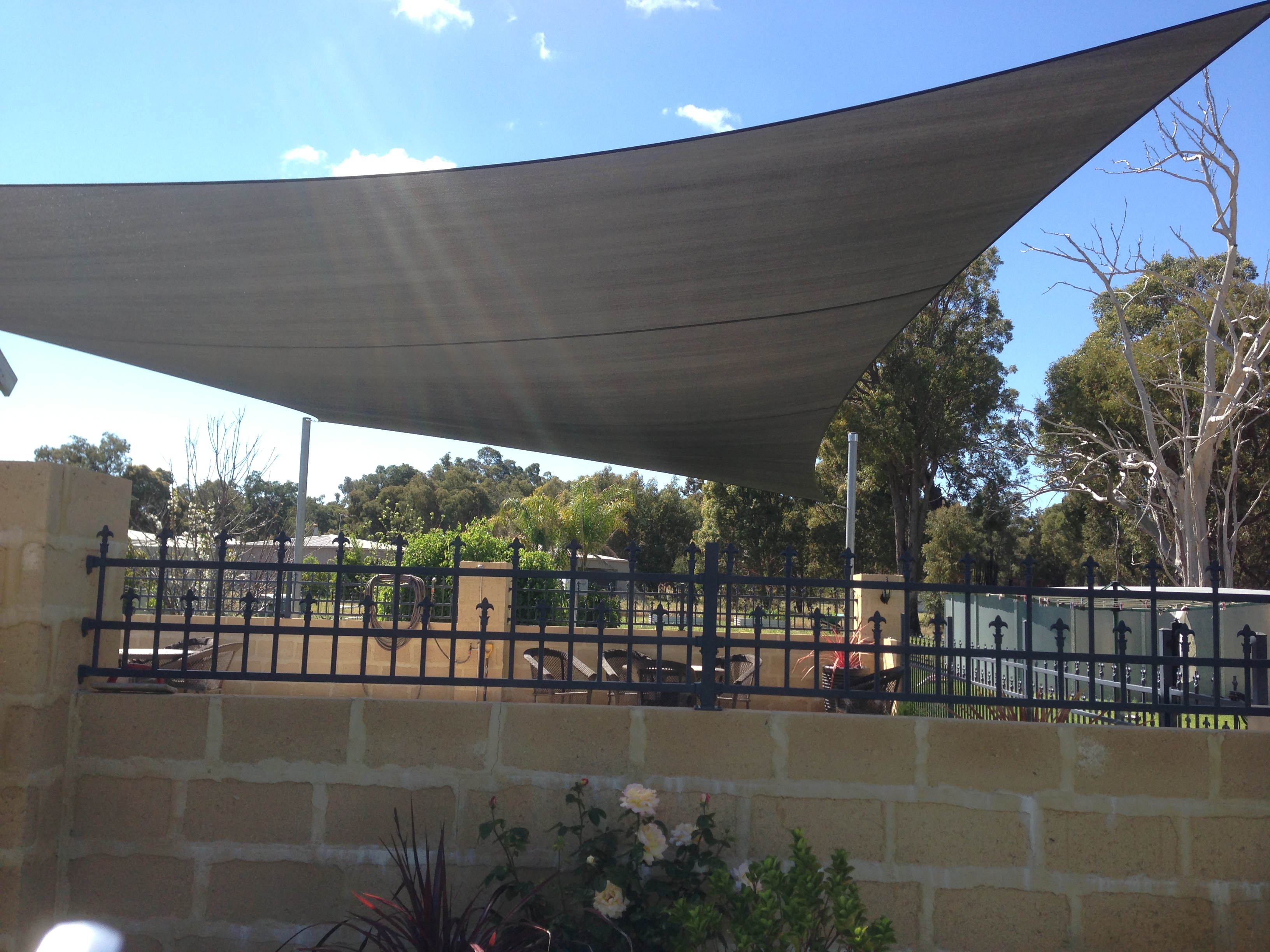 Custom shade sail installed in Sydney backyard