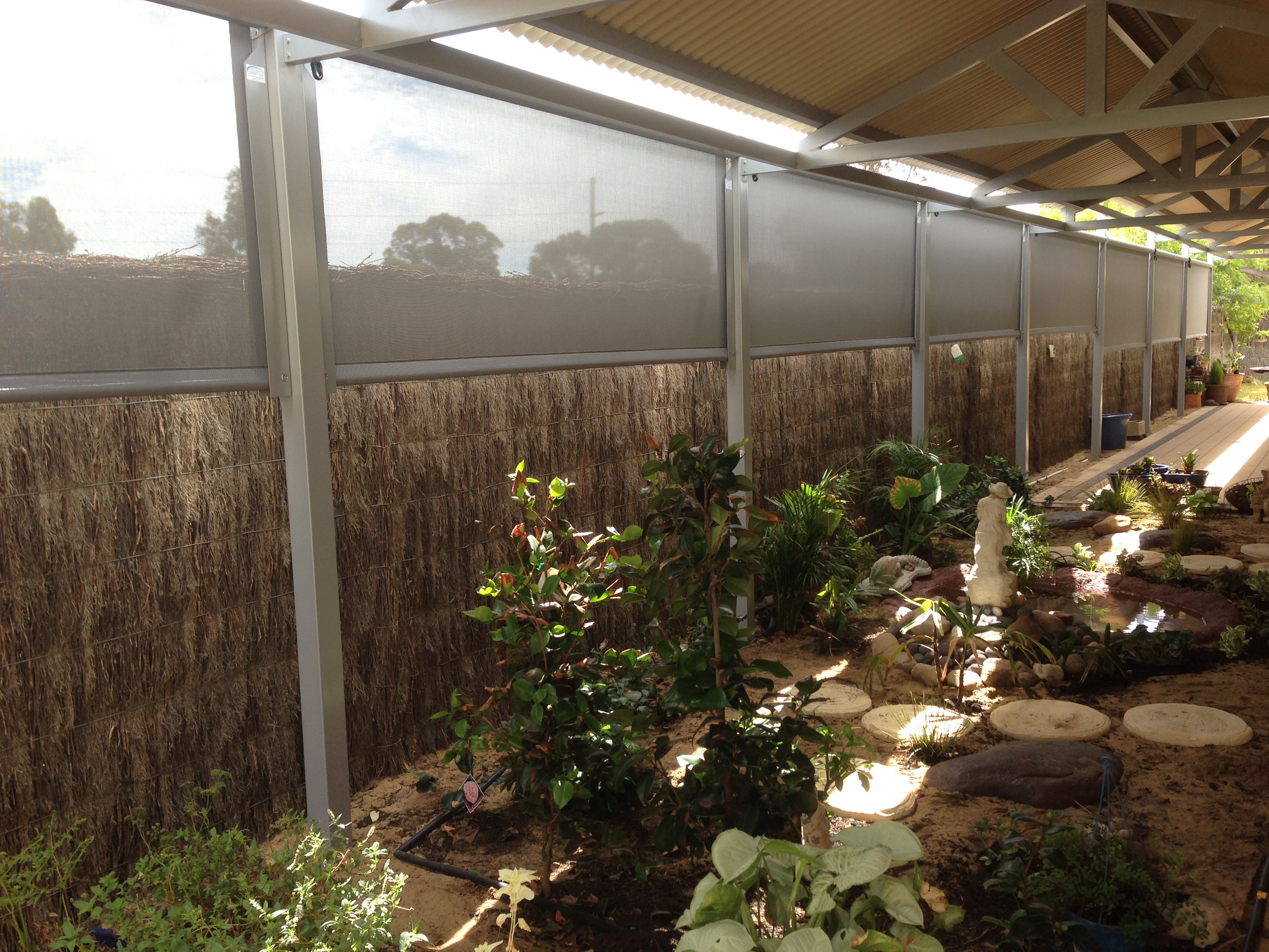 Track guided outdoor blinds sealed down the sides
